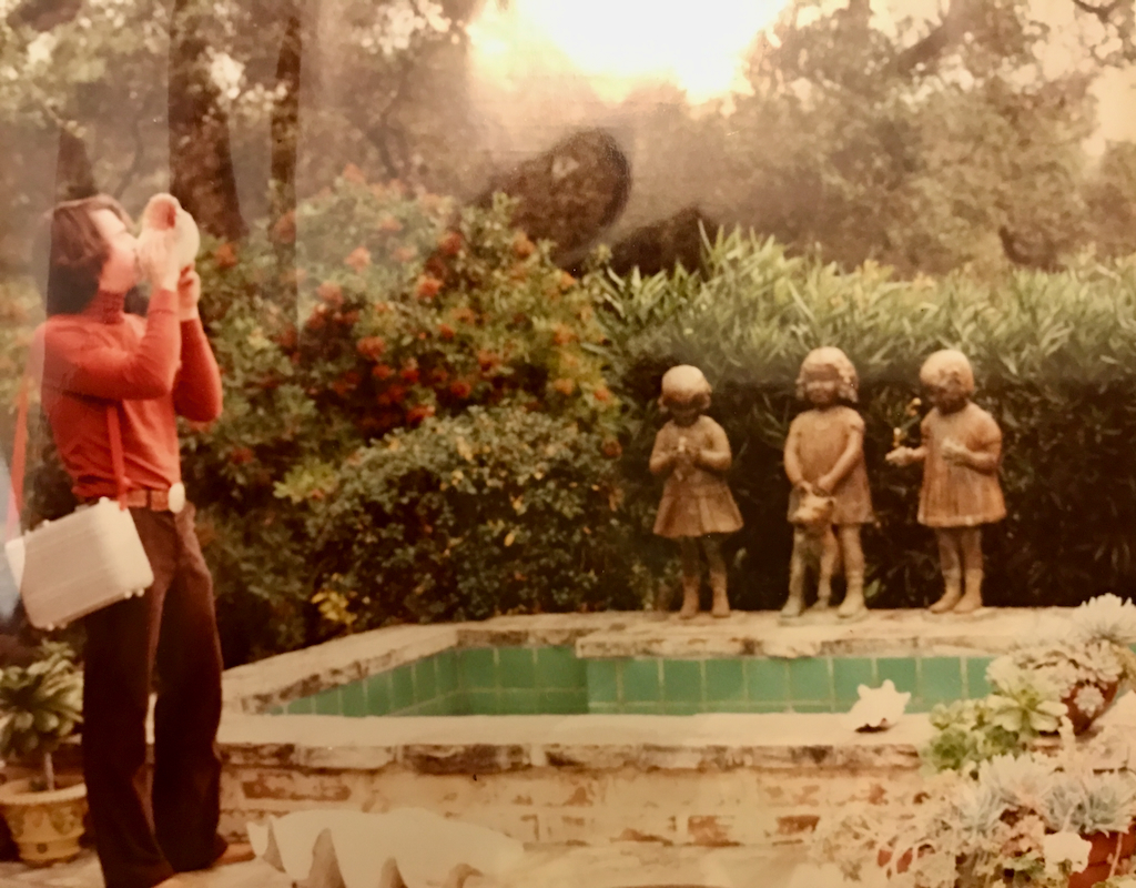 Outside fountain with Jo Mora statues.
